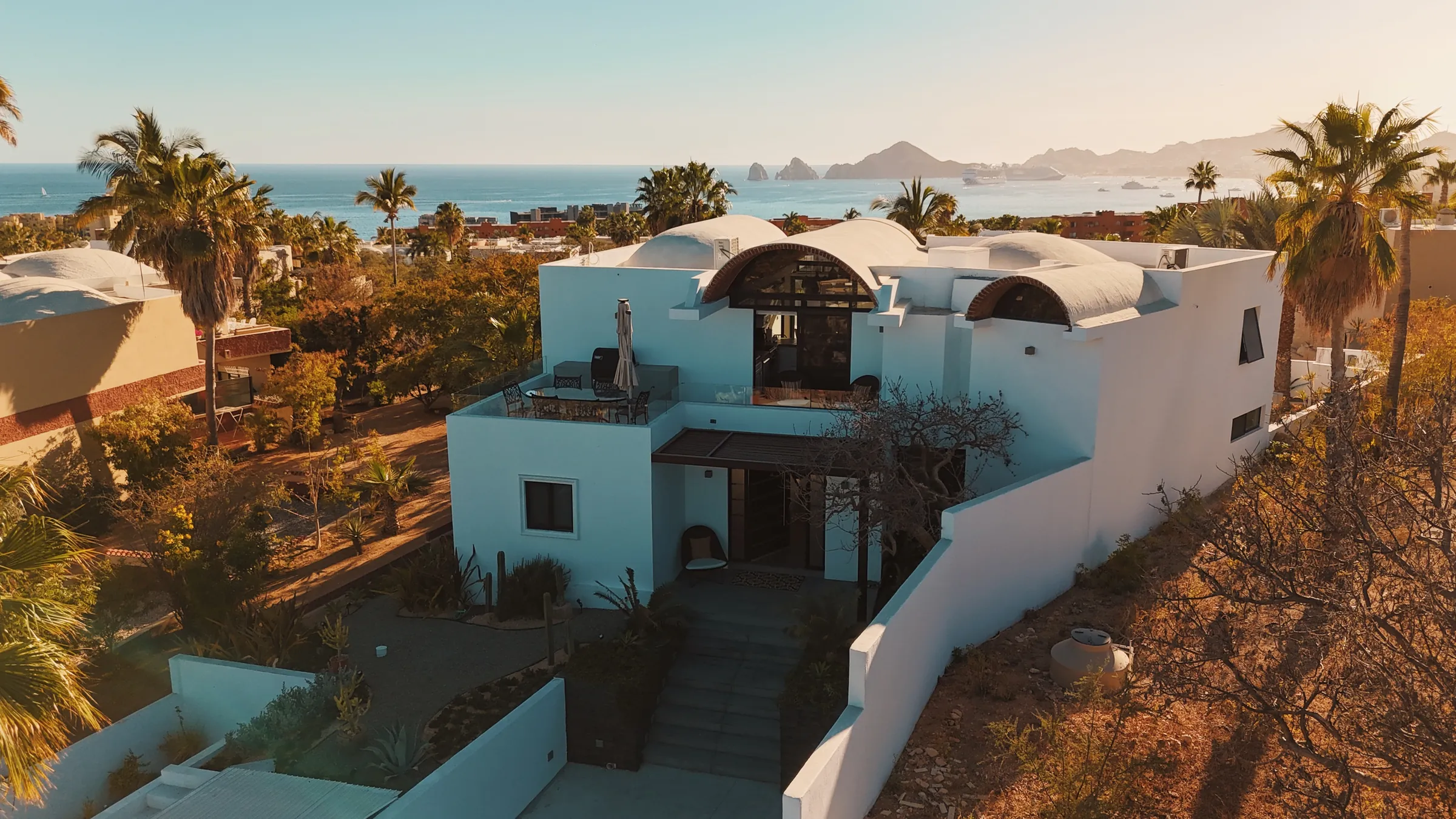 Aerial view of the Cabo coastline and villa surroundings